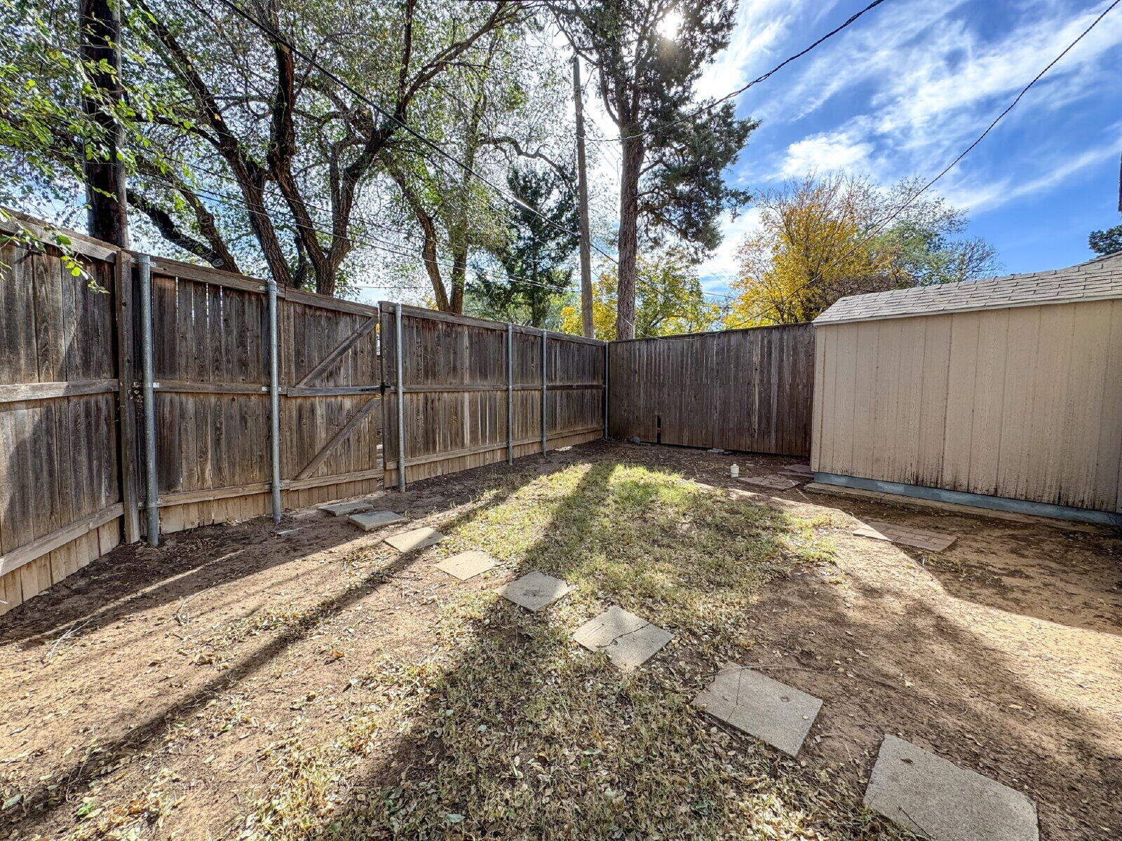 2909 Canton Avenue Lubbock, TX 79410 - Photo 17 of 18 a view of small yard with wooden fence
