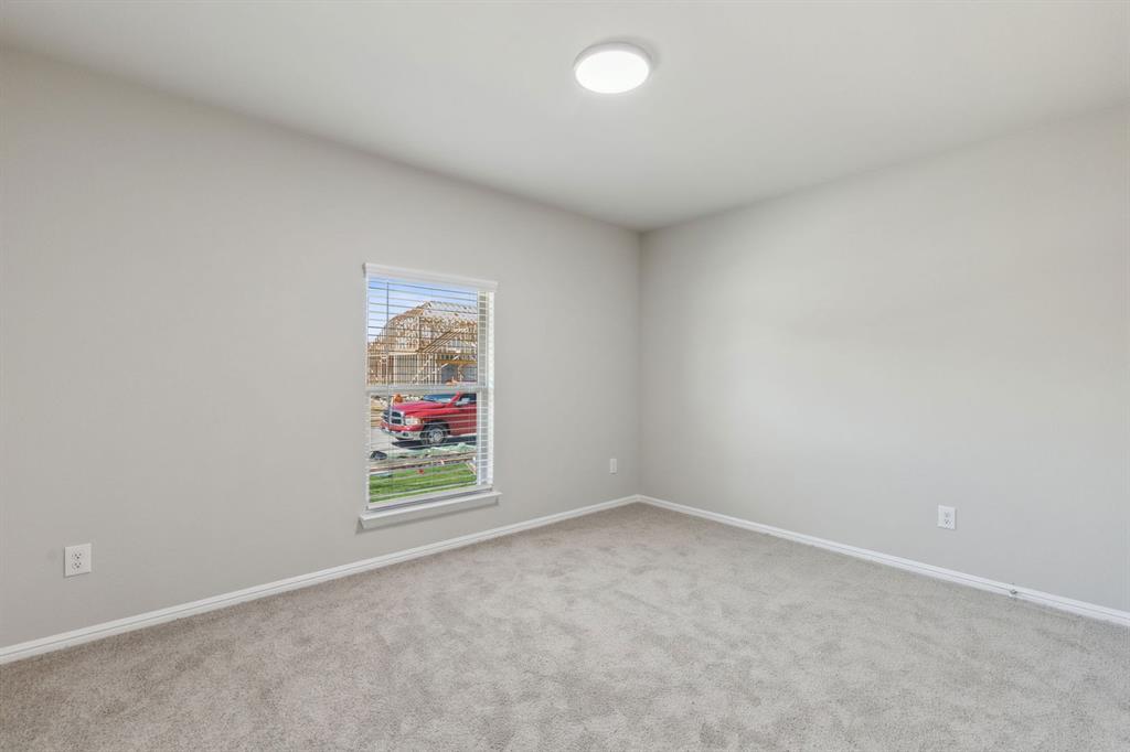 475 Sierra Ridge Lavon, TX 75166 - Photo 24 of 36 an empty room with window