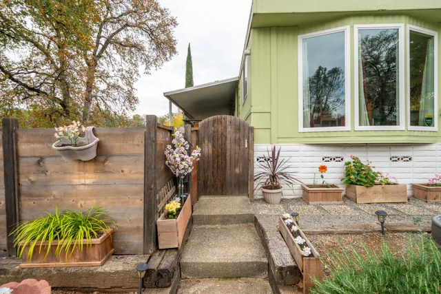 a front view of a house with patio