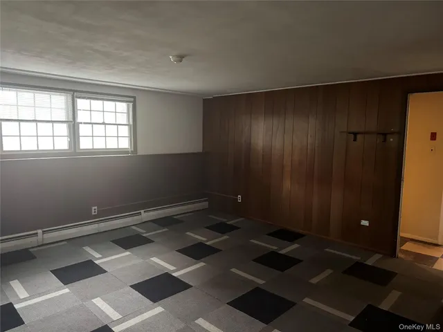 wooden floor and window in a room