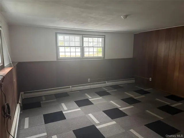 a view of a room with a window