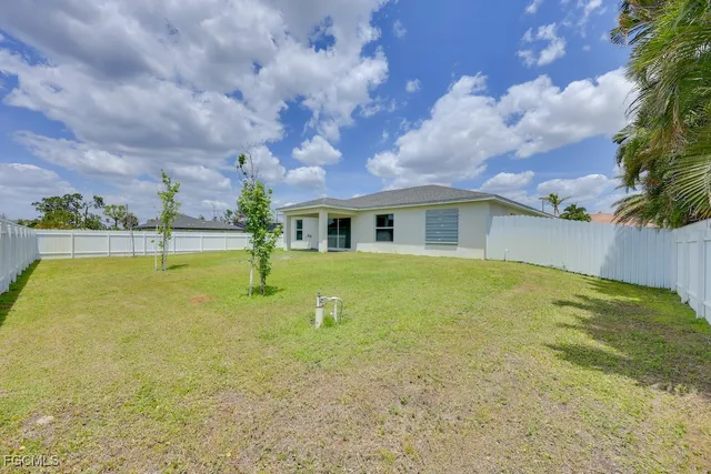 a view of outdoor space yard and front view of a house