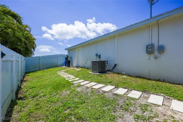 a house view with a backyard space