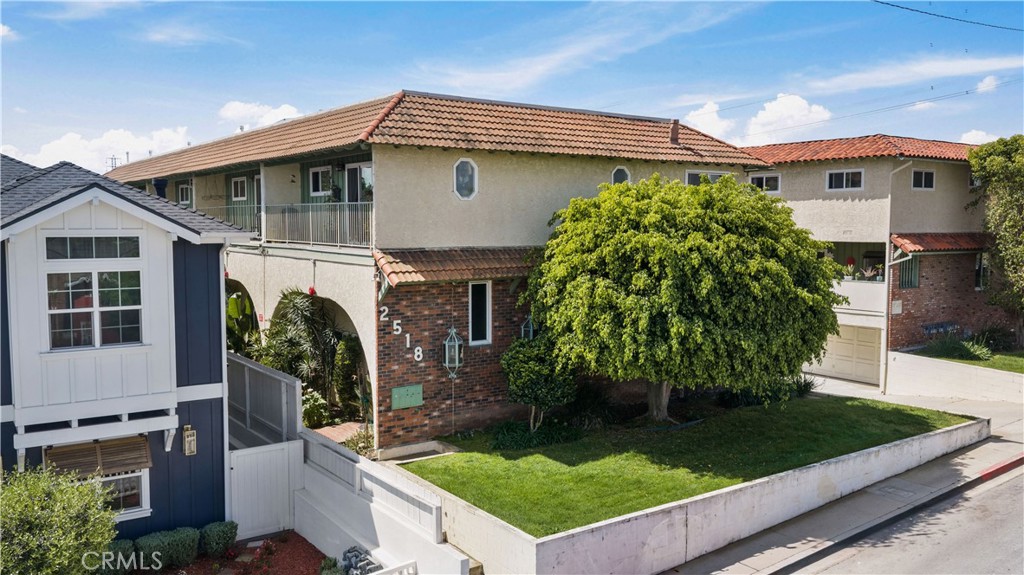 2518 Curtis Avenue, Unit 3 Redondo Beach, CA 90278 - Photo 1 of 35 a front view of a house with garden