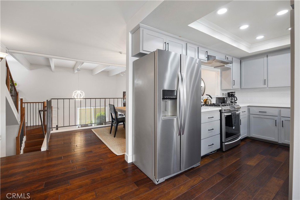2518 Curtis Avenue, Unit 3 Redondo Beach, CA 90278 - Photo 11 of 35 a kitchen with a refrigerator a sink and dishwasher