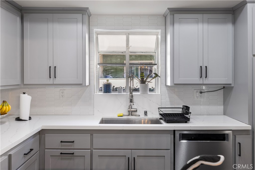 2518 Curtis Avenue, Unit 3 Redondo Beach, CA 90278 - Photo 12 of 35 a kitchen with a sink cabinets and window