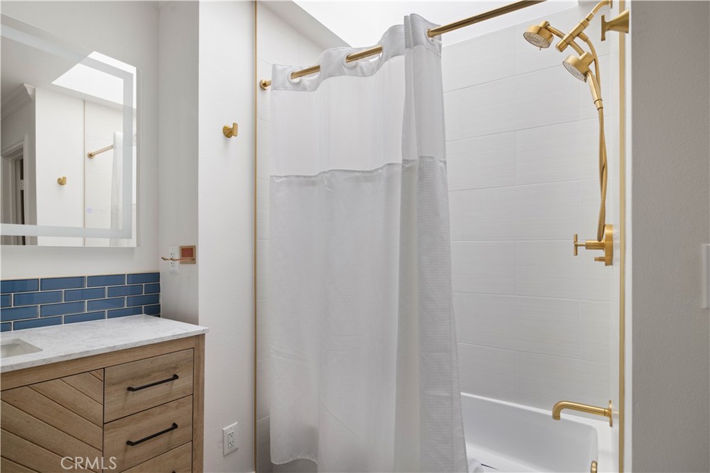 2518 Curtis Avenue, Unit 3 Redondo Beach, CA 90278 - Photo 19 of 35 a bathroom with a sink and shower