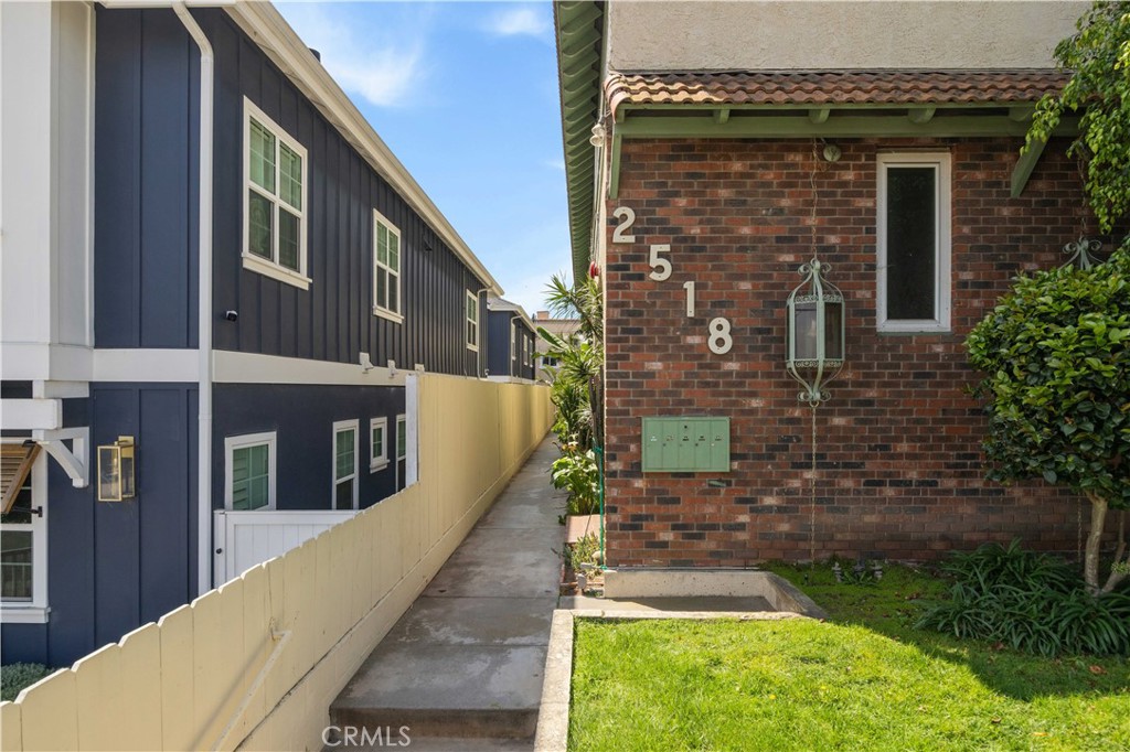 2518 Curtis Avenue, Unit 3 Redondo Beach, CA 90278 - Photo 31 of 35 a view of a brick house with a yard