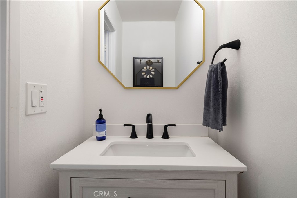 2518 Curtis Avenue, Unit 3 Redondo Beach, CA 90278 - Photo 8 of 35 a bathroom with a sink and a mirror