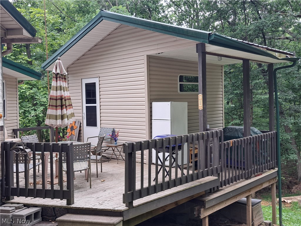 17875 Lashley Road, Unit 124 Senecaville, OH 43780 - Photo 7 of 45 View of wooden deck and bunkhouse