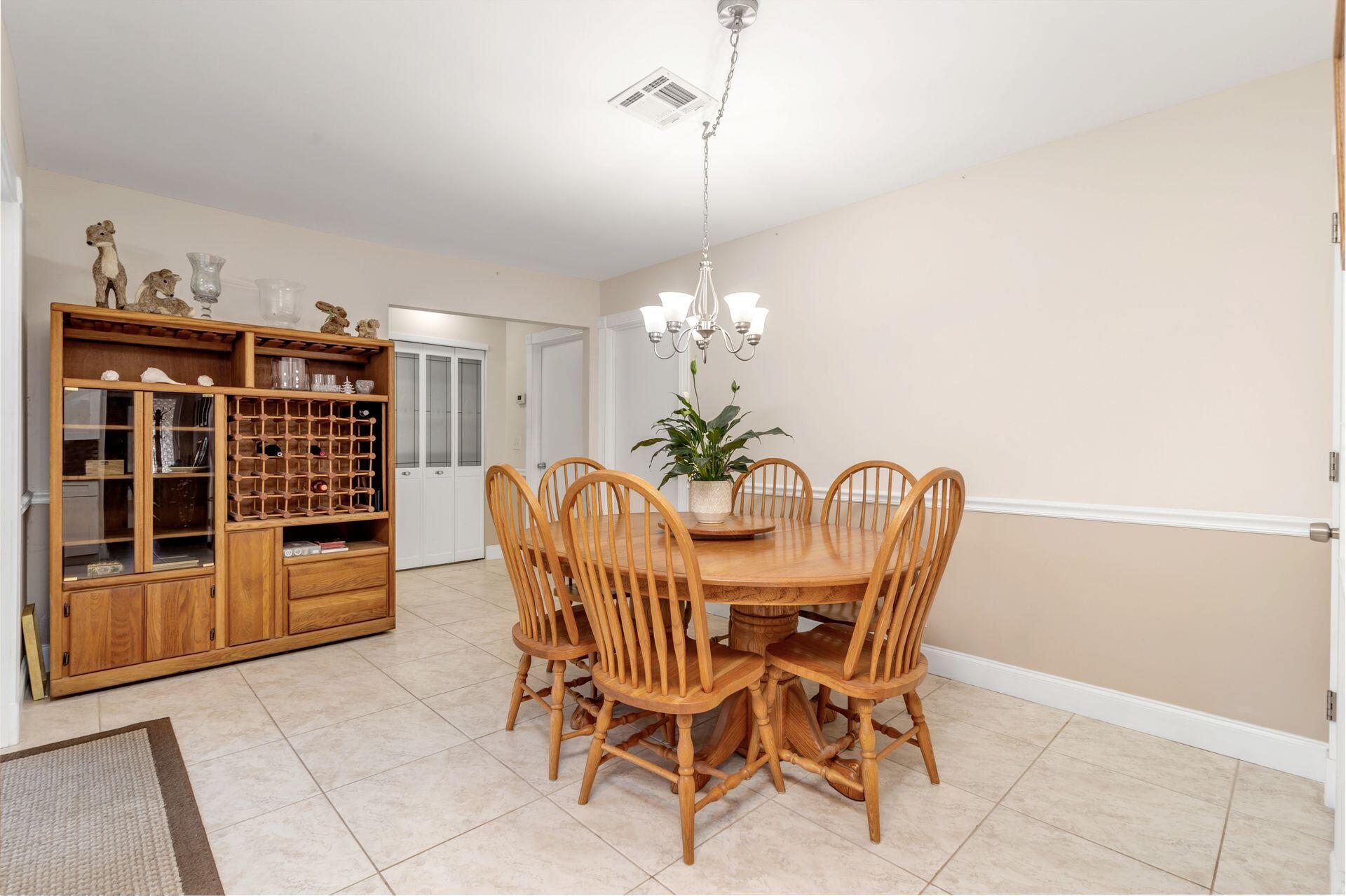 502 Oak Terrace Jupiter, FL 33458 - Photo 11 of 37 Family room is used as dining room