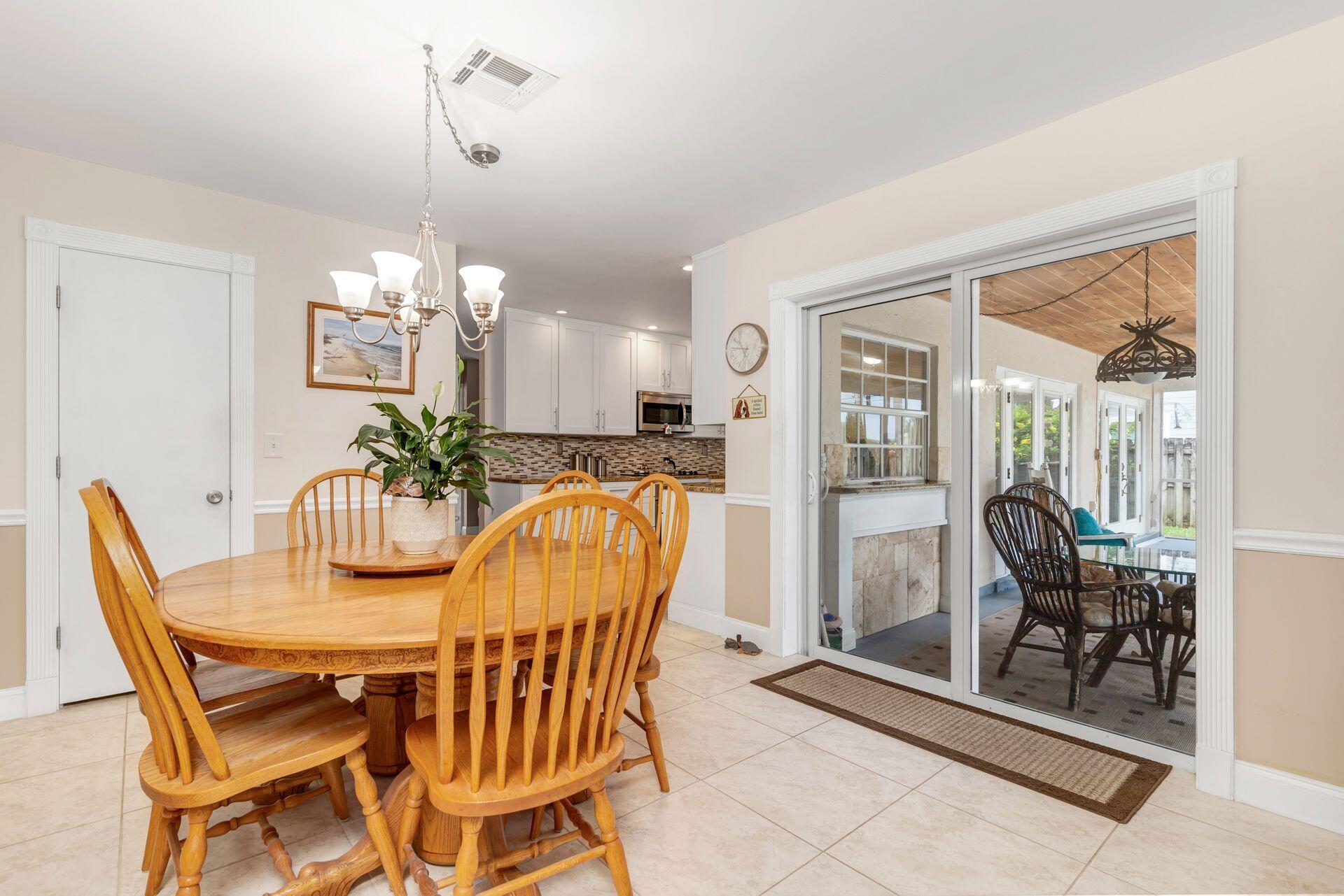 502 Oak Terrace Jupiter, FL 33458 - Photo 12 of 37 Family room is being used as dining room