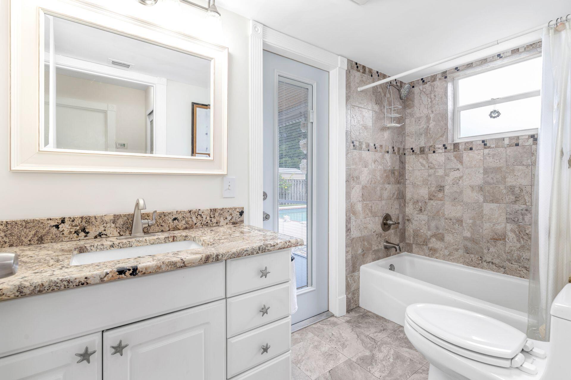 502 Oak Terrace Jupiter, FL 33458 - Photo 17 of 37 guest batjroom