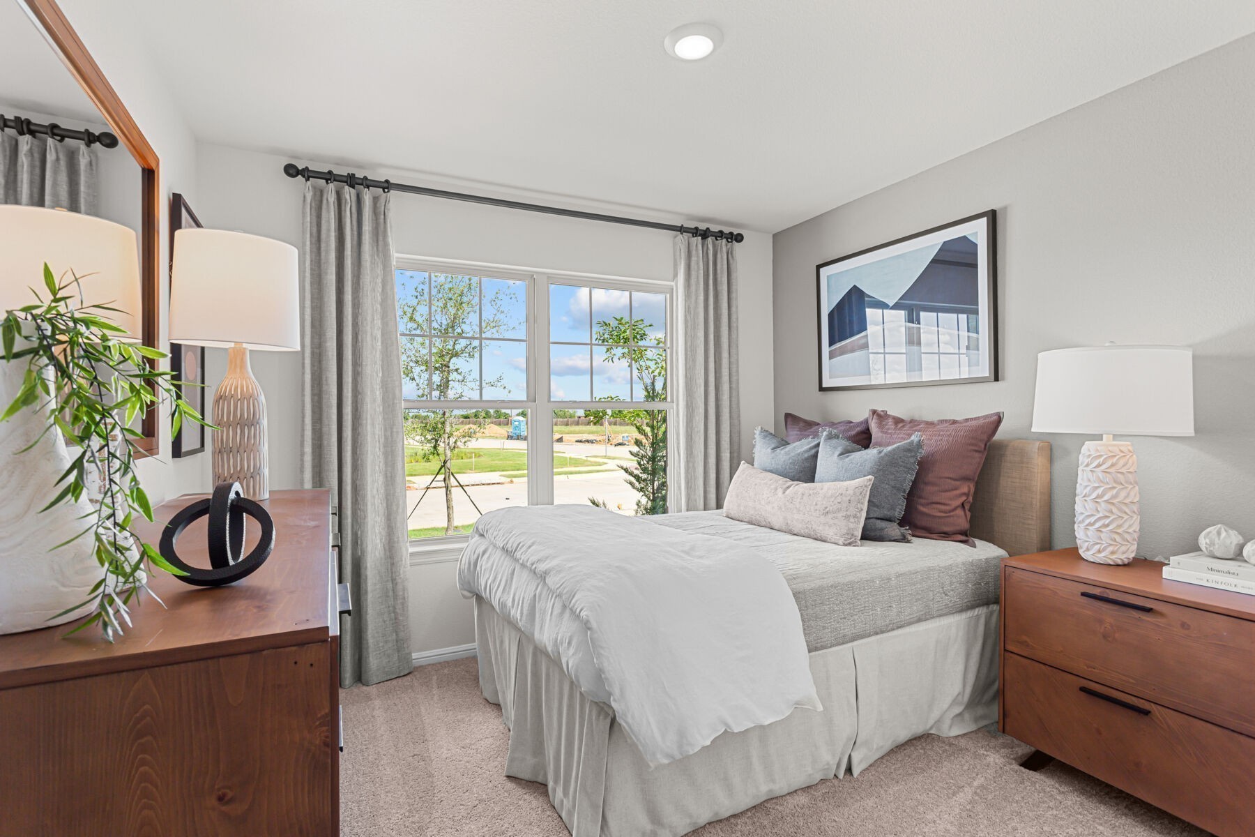 219 Conger Drive Lebanon, TN 37087 - Photo 3 of 21 a bedroom with a bed a chandelier and a flat tv screen