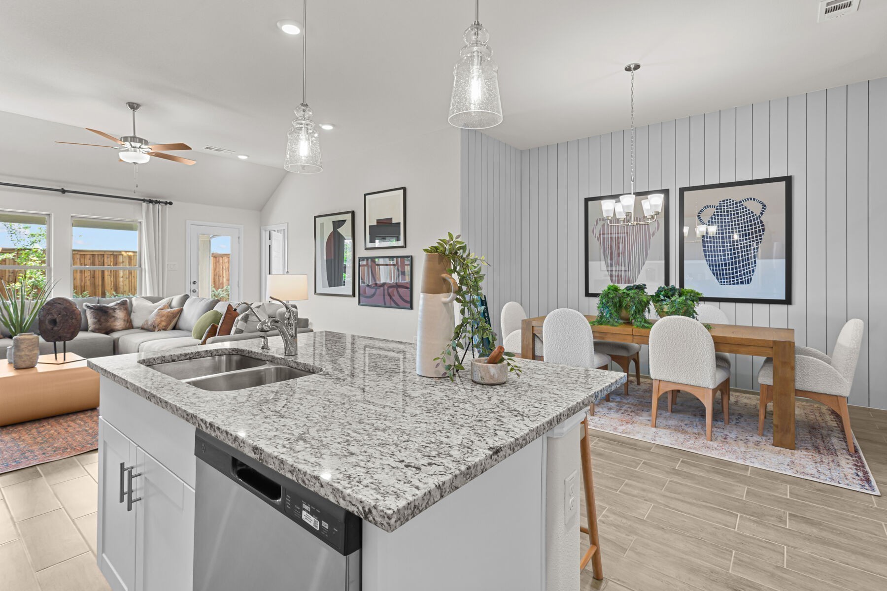 219 Conger Drive Lebanon, TN 37087 - Photo 5 of 21 a kitchen with granite countertop kitchen island stainless steel appliances a dining table and chairs