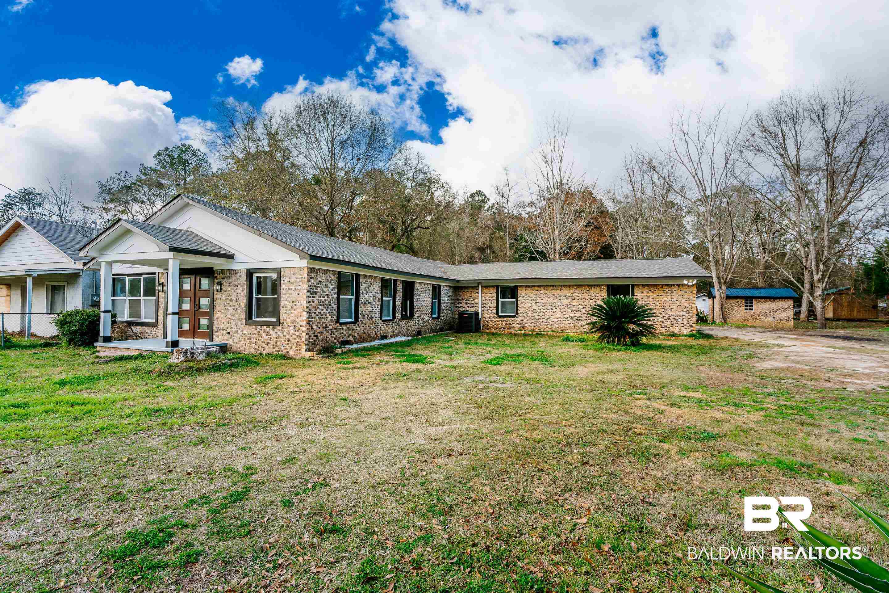 1190 Military Road Mount Vernon, AL 36560 - Photo 44 of 47 View of front of property featuring a front lawn and brick siding