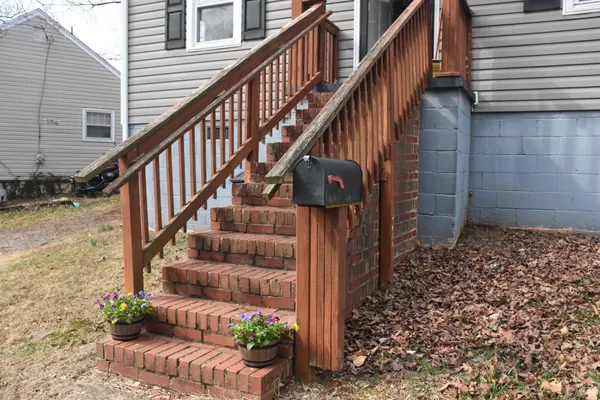 a view of entryway with wooden floor