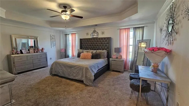 a bedroom with a bed and furniture