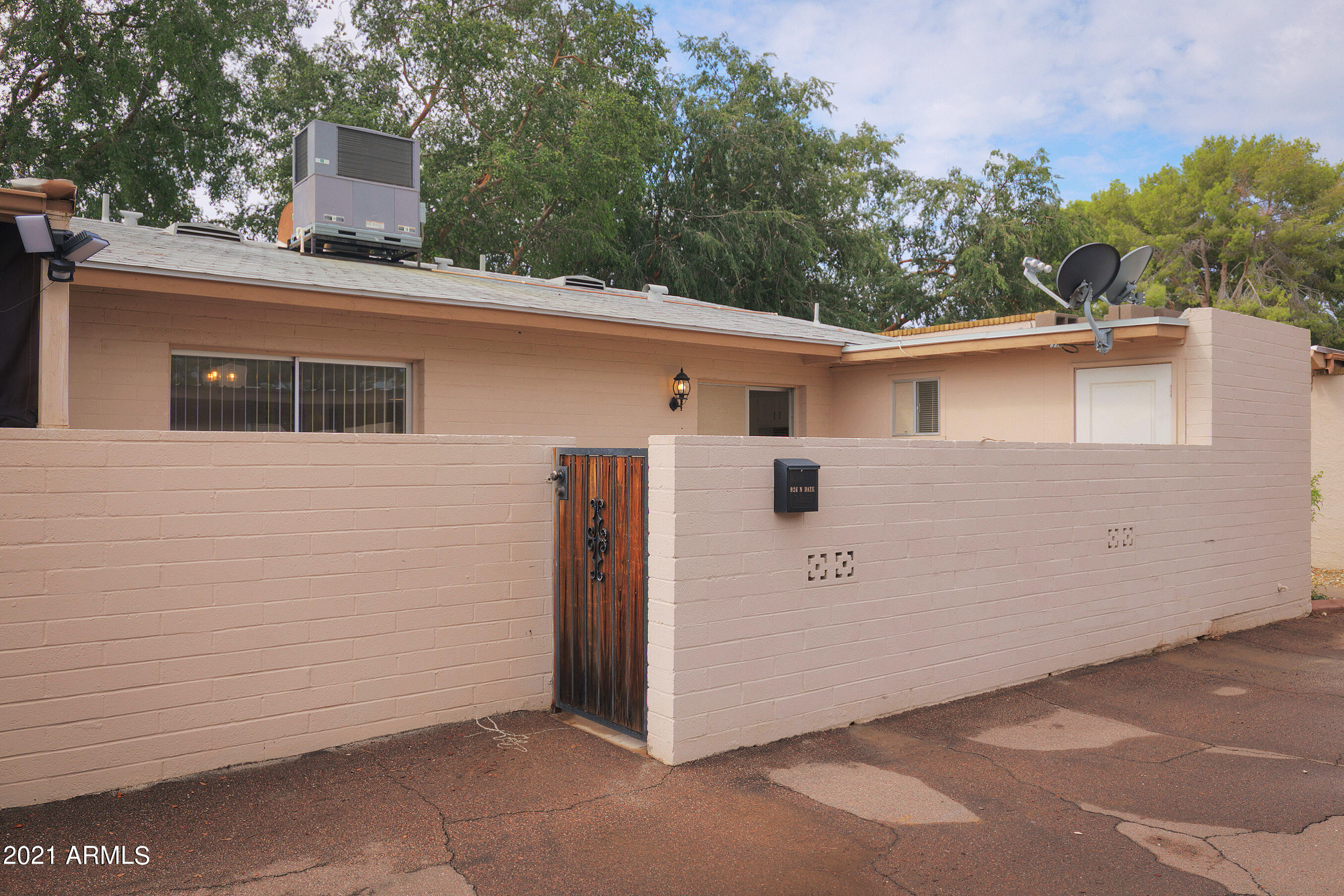 926 North Date Mesa, AZ 85201 - Photo 23 of 24 a view of a white house with a large windows