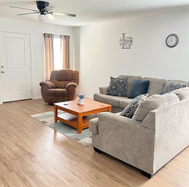 14941 Trapper Trail Haslet, TX 76052 - Photo 11 of 22 a living room with furniture and a window