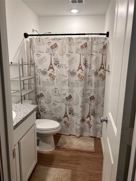 14941 Trapper Trail Haslet, TX 76052 - Photo 17 of 22 a bathroom with a toilet and a shower