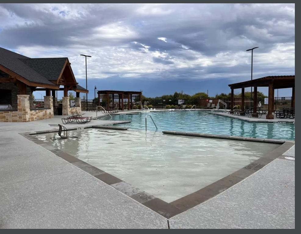14941 Trapper Trail Haslet, TX 76052 - Photo 21 of 22 a view of a swimming pool