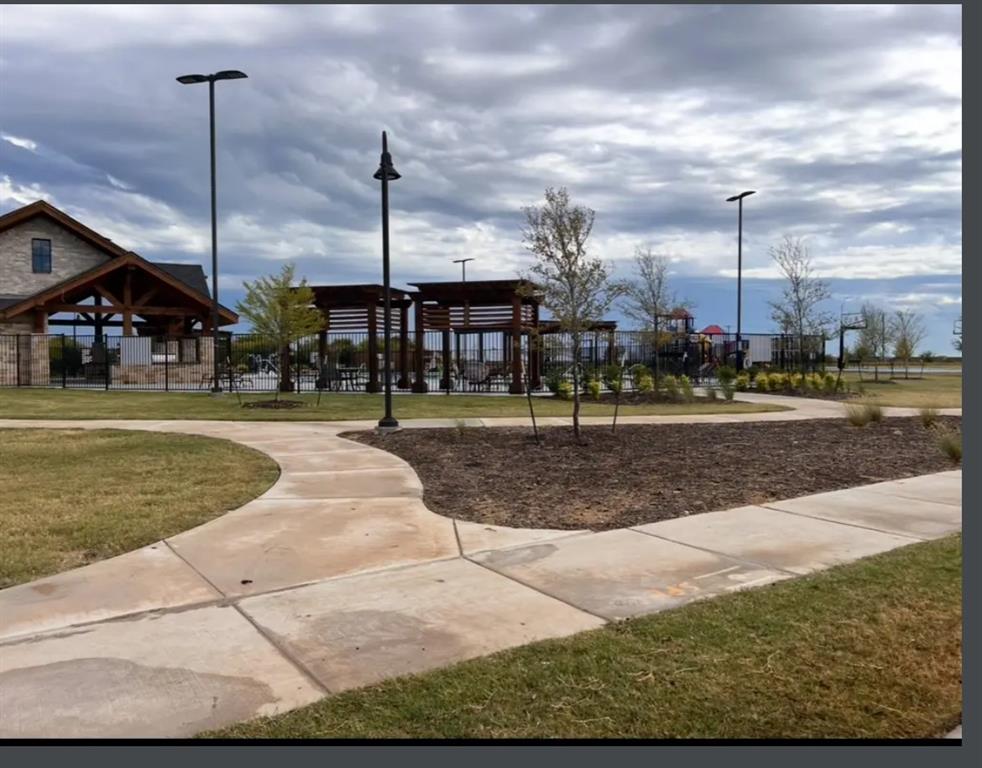 14941 Trapper Trail Haslet, TX 76052 - Photo 22 of 22 a view of a yard in the front of a building