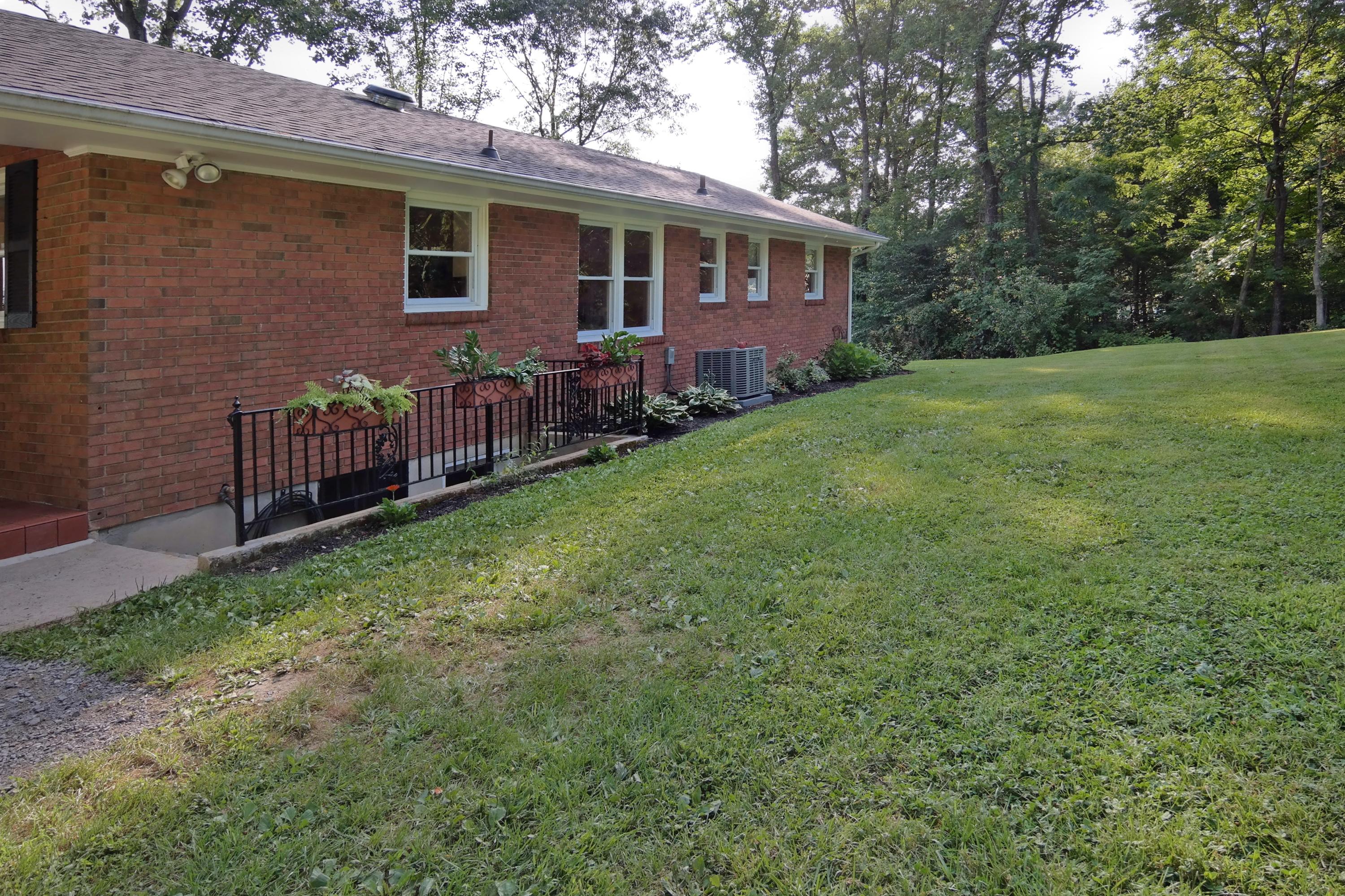 2144 Blue Ridge Springs Road Blue Ridge, VA 24064 - Photo 13 of 35 a view of front of a house with a yard