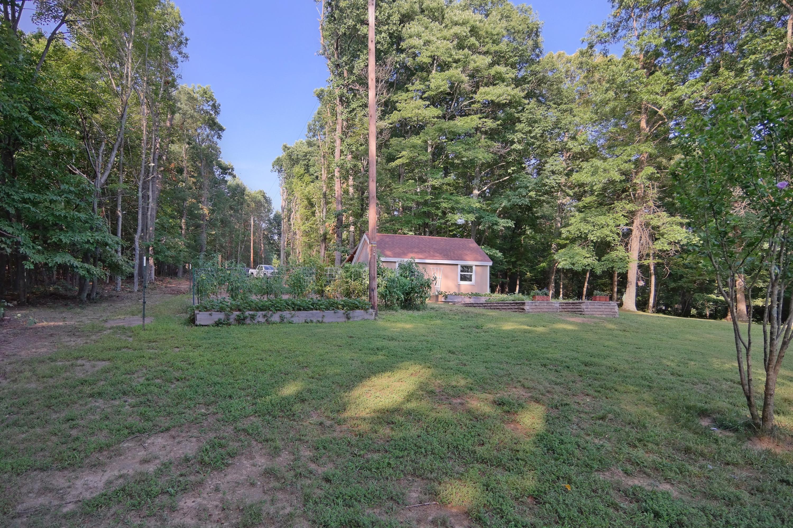 2144 Blue Ridge Springs Road Blue Ridge, VA 24064 - Photo 4 of 35 a view of a big yard with large trees