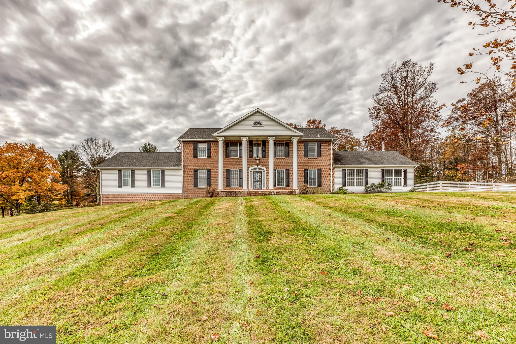 Stunning Greek Revival on 5.5 acre private lot