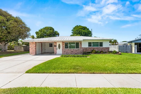 $450,000 | 245 Greenbriar Drive, Lake Park, FL 33403