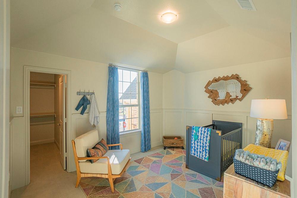 330 Aeronca Drive Fate, TX 75087 - Photo 18 of 32 a living room with furniture and a window