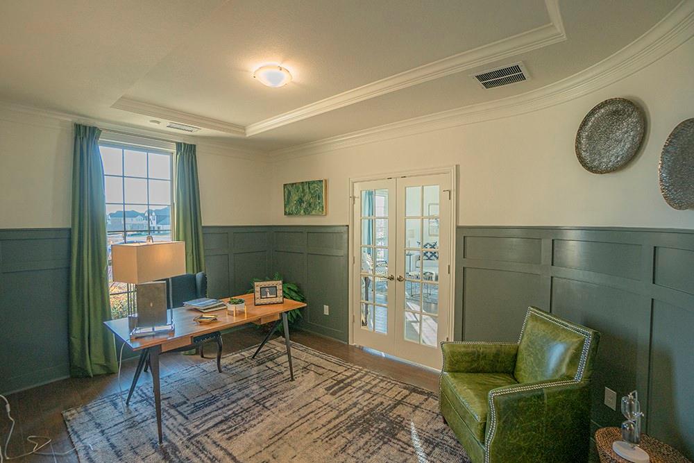 330 Aeronca Drive Fate, TX 75087 - Photo 2 of 32 a living room with furniture and a wooden floor
