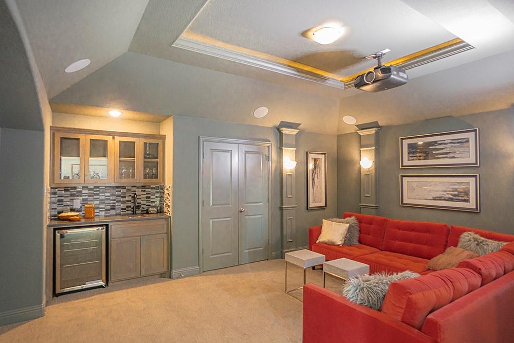 330 Aeronca Drive Fate, TX 75087 - Photo 24 of 32 a living room with furniture and a kitchen