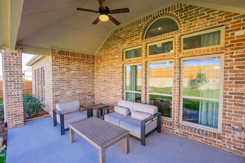 330 Aeronca Drive Fate, TX 75087 - Photo 25 of 32 a spacious bedroom with furniture and a window