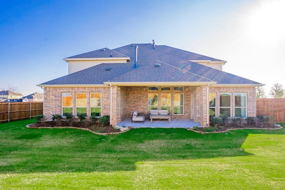 330 Aeronca Drive Fate, TX 75087 - Photo 27 of 32 a front view of a house with garden