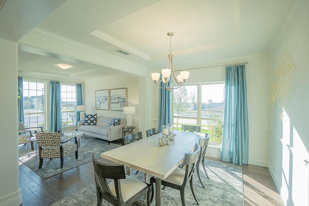 330 Aeronca Drive Fate, TX 75087 - Photo 4 of 32 a view of a dining room with furniture window and outside view