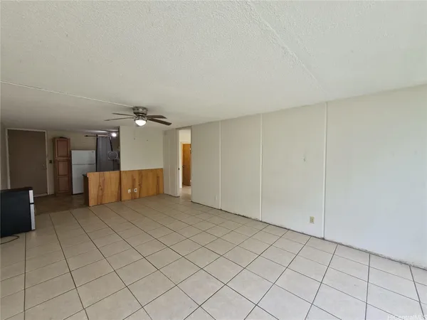 a view of a utility room with windows
