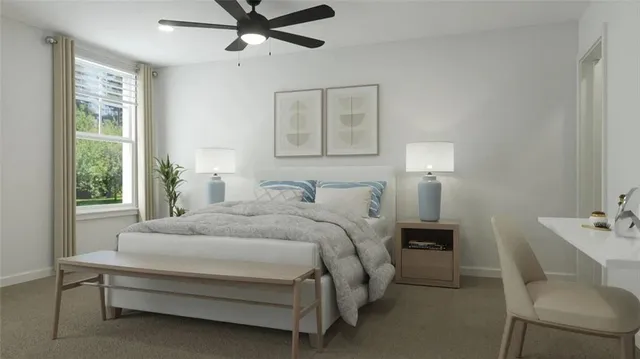 a bedroom with a bed and a table