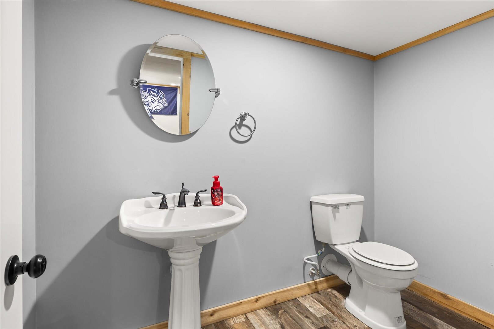742 Chambers Street Ottawa, IL 61350 - Photo 32 of 39 a bathroom with a toilet sink and mirror
