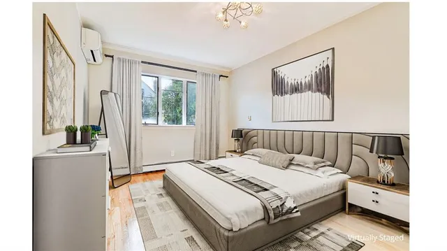 a bed room with a bed and a window