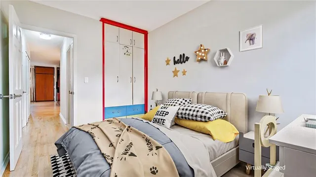 a bedroom with a bed and a table