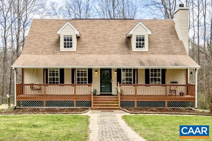 462 Fox Hunters Lane Madison, VA 22727 - Photo 1 of 65 a front view of a house with a yard
