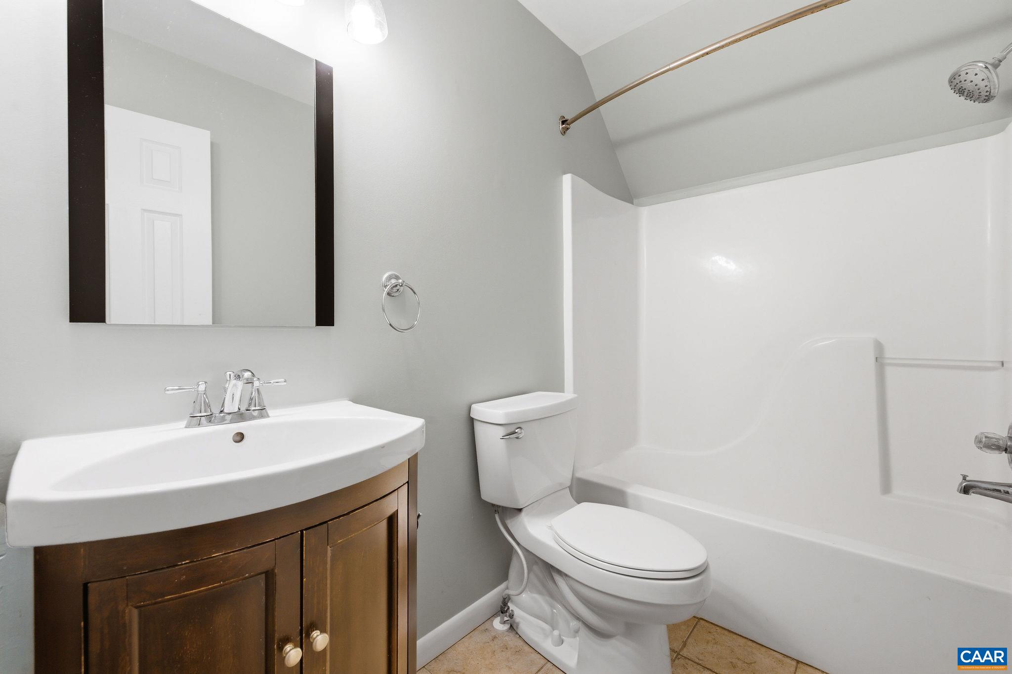 462 Fox Hunters Lane Madison, VA 22727 - Photo 30 of 65 a bathroom with a sink a toilet and shower