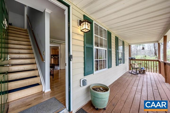 462 Fox Hunters Lane Madison, VA 22727 - Photo 3 of 65 a view of outdoor space with wooden floor and windows