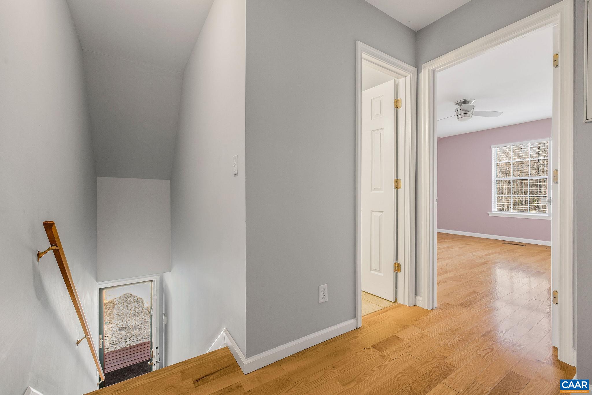 462 Fox Hunters Lane Madison, VA 22727 - Photo 34 of 65 a view of an empty room with window and wooden floor