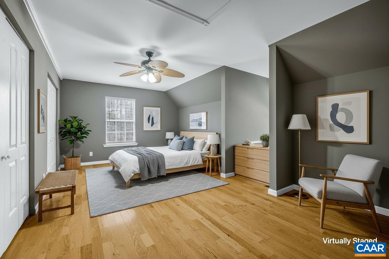 462 Fox Hunters Lane Madison, VA 22727 - Photo 36 of 65 a spacious bedroom with a bed and window