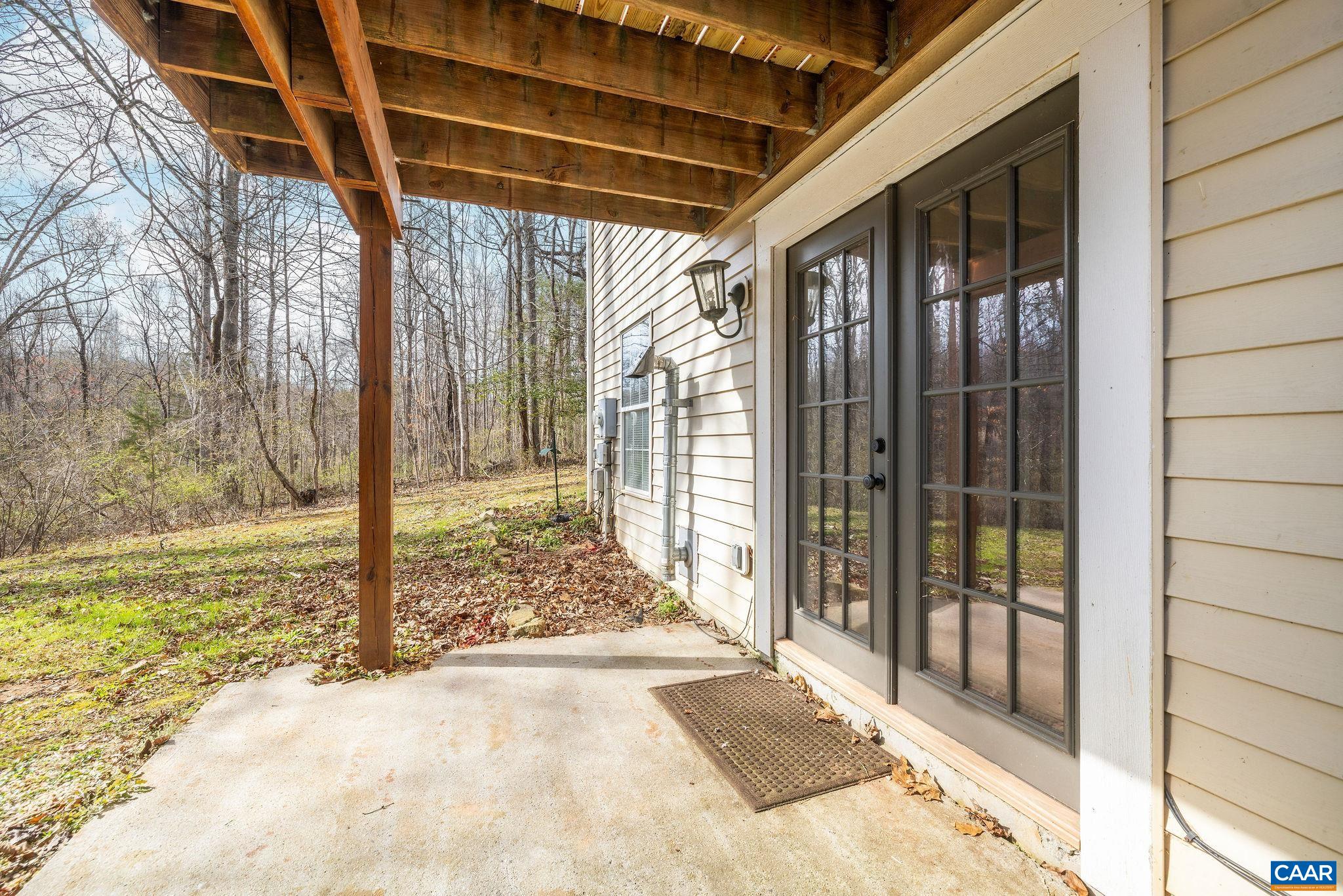 462 Fox Hunters Lane Madison, VA 22727 - Photo 48 of 65 a view of a porch with a backyard