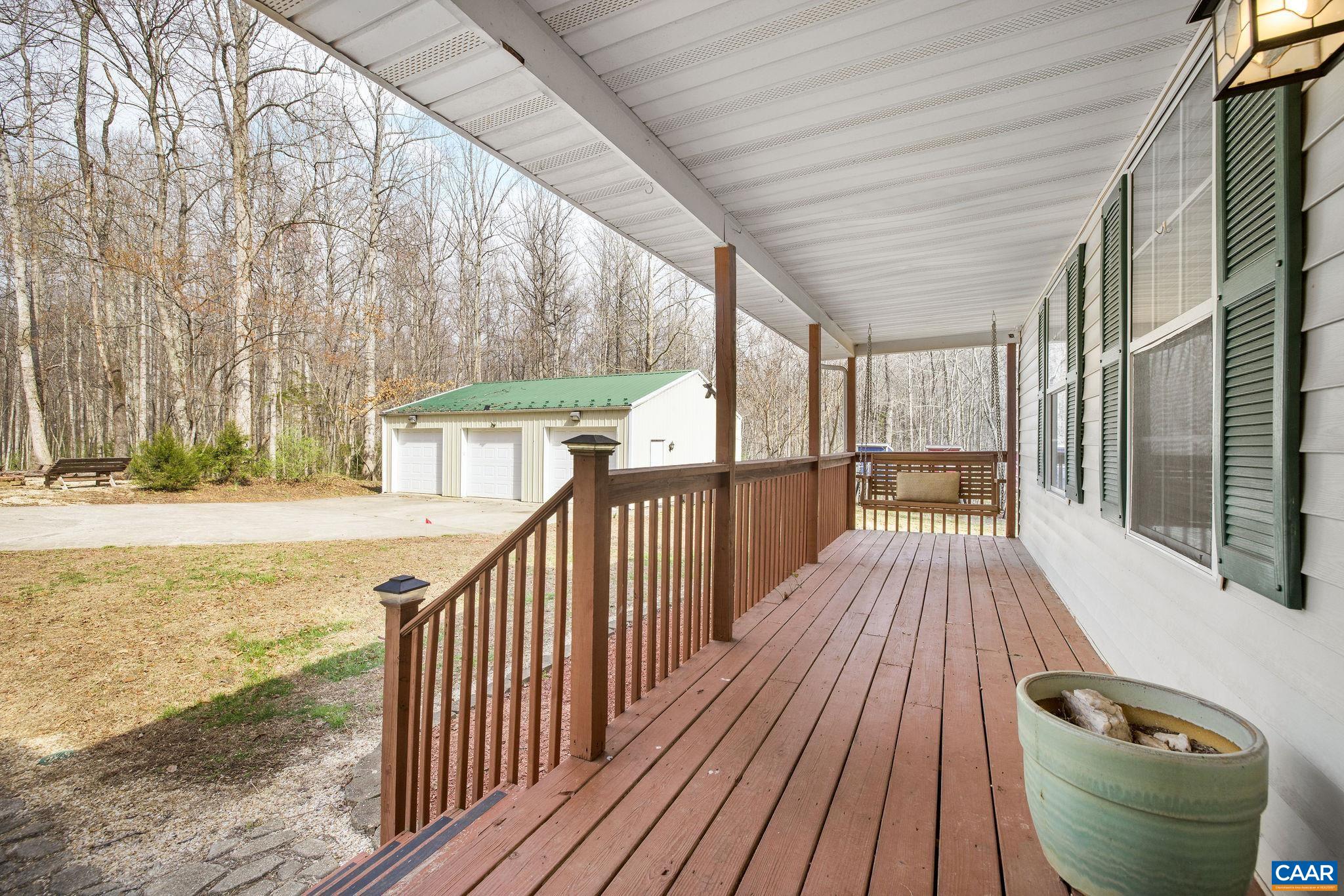 462 Fox Hunters Lane Madison, VA 22727 - Photo 10 of 65 a view of balcony with wooden floor and fence