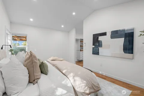 a bed room with a bed and furniture